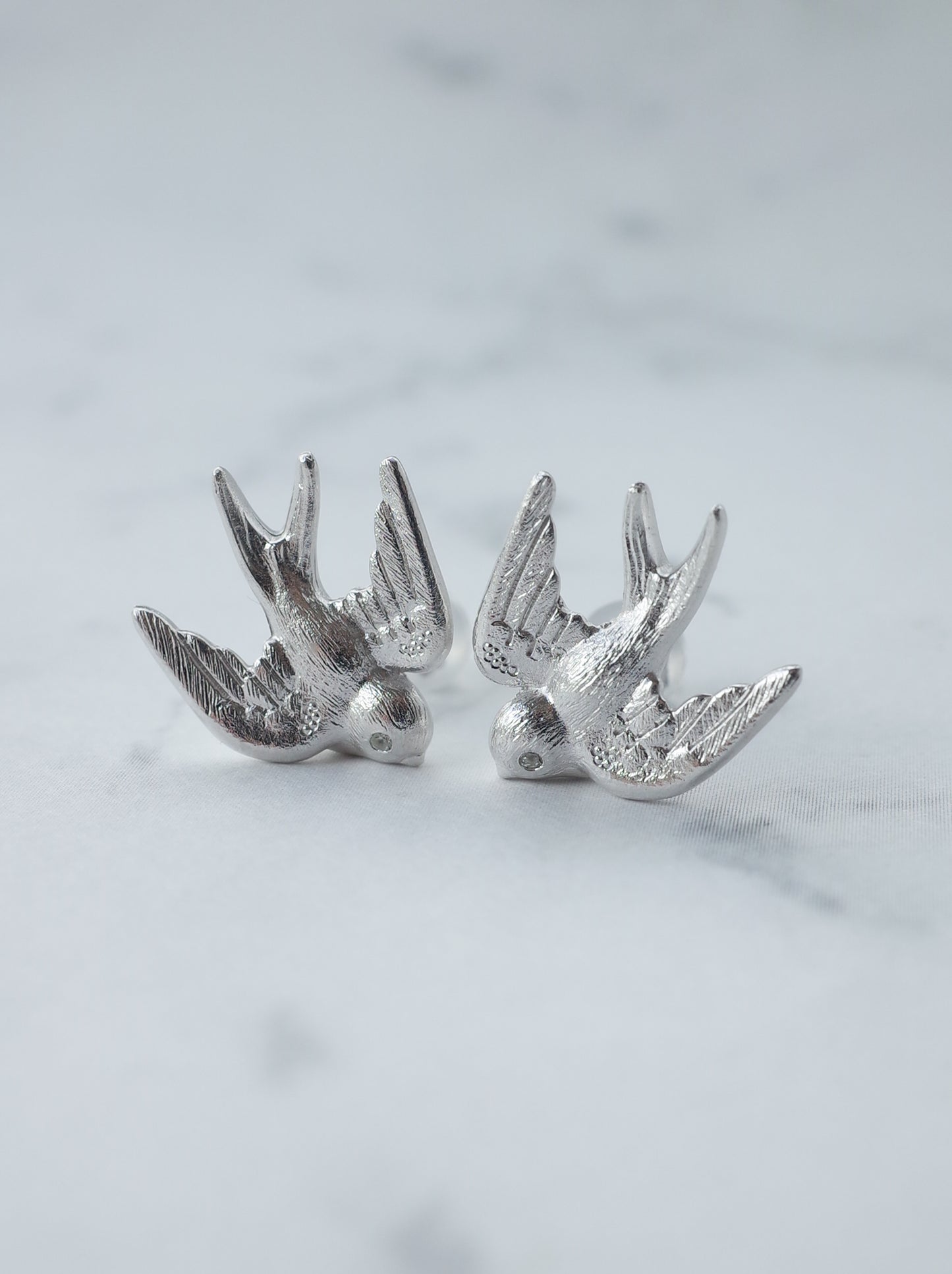SWALLOW stud earrings