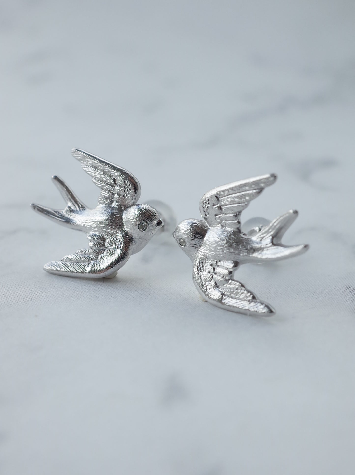 SWALLOW stud earrings