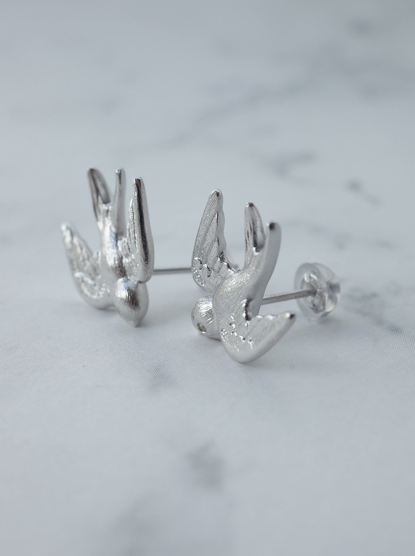 SWALLOW stud earrings