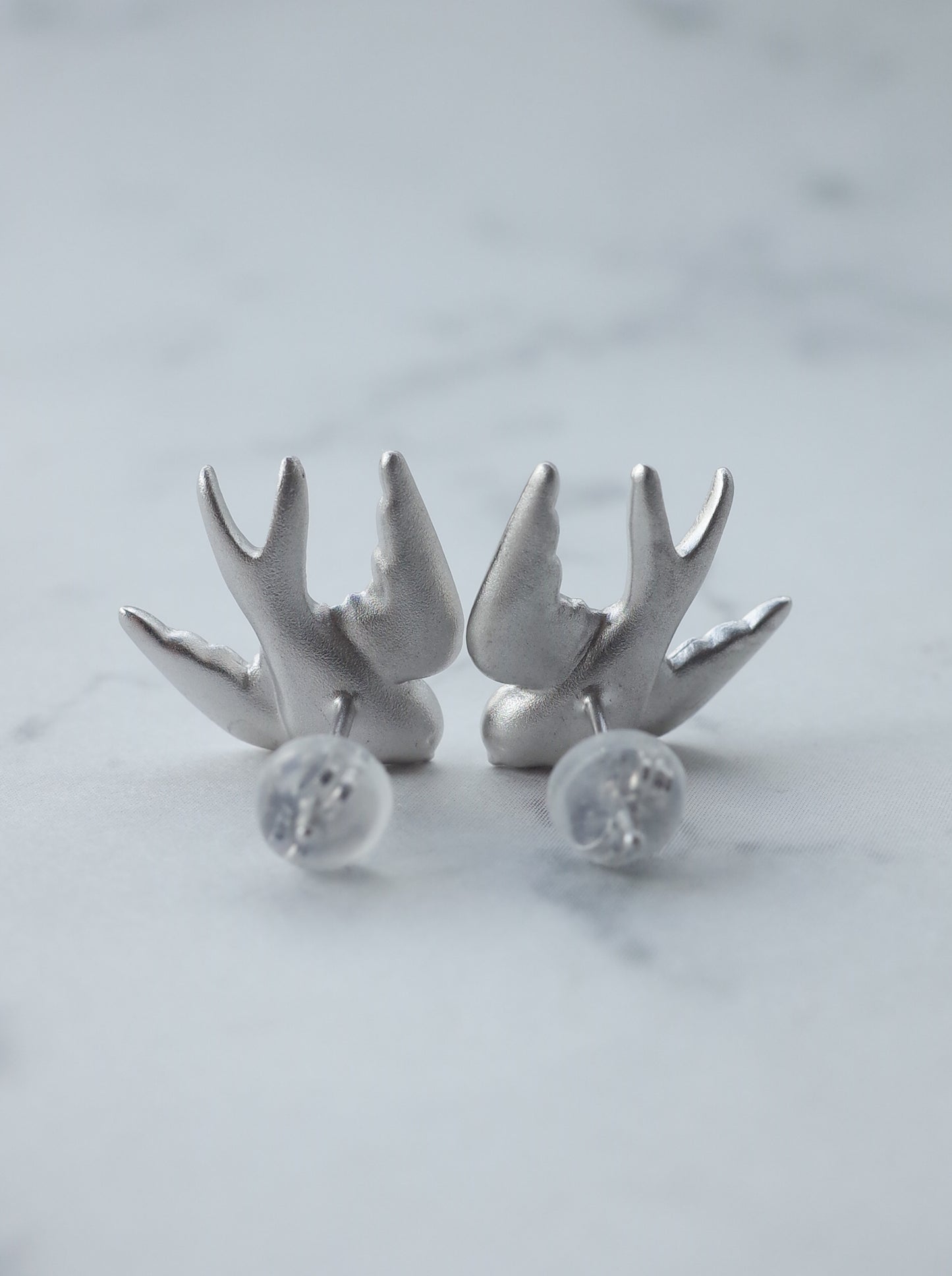SWALLOW stud earrings