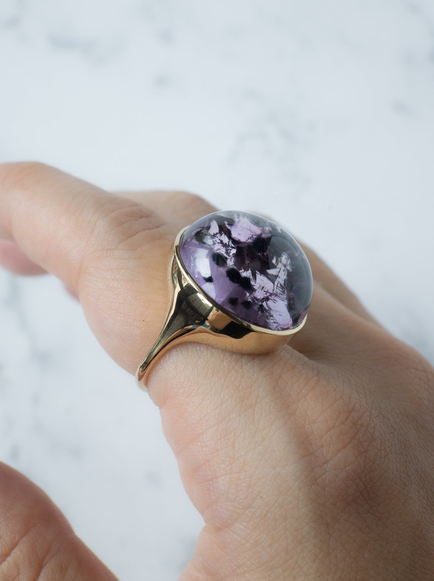 Romanechite in Quartz Ring